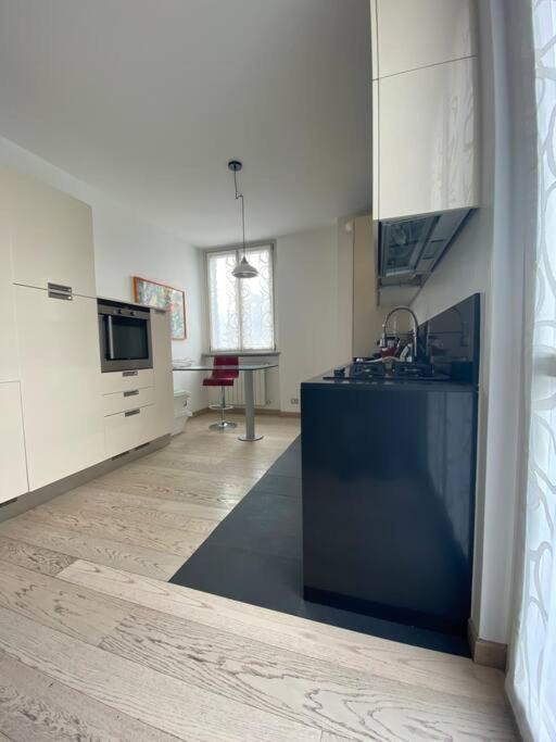 Maison Minu Appartement Porto Ceresio Buitenkant foto